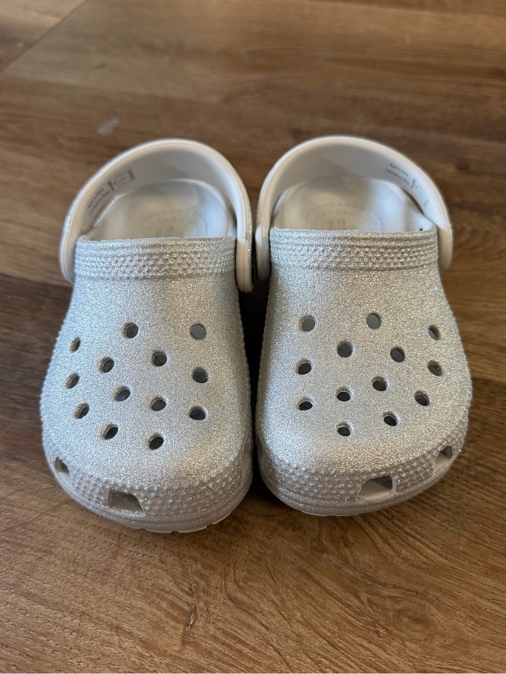 CROCS Kids Glitter Clogs in Silver White